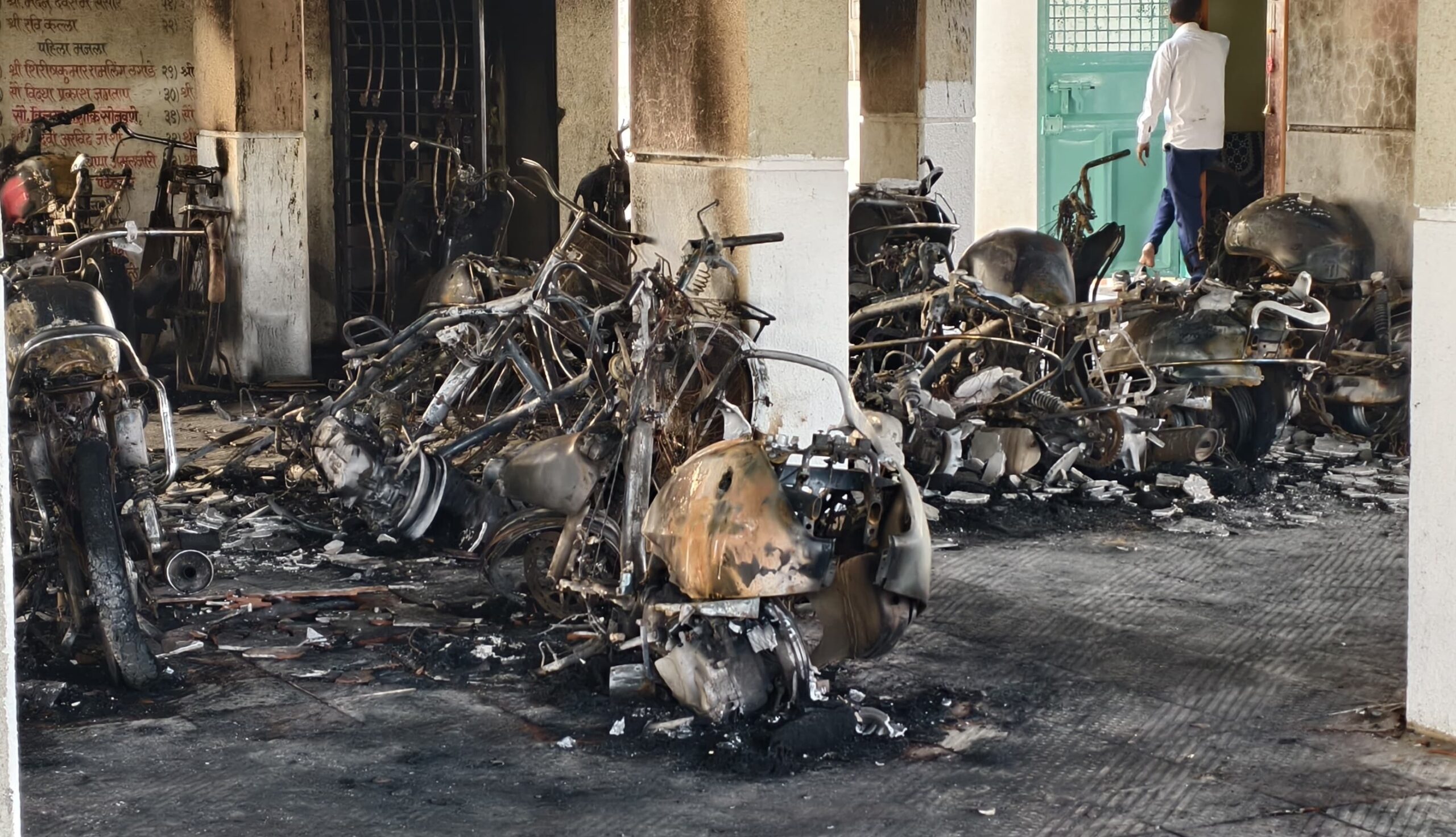 A midnight act of malice leaves families in despair. The skeletal remains of these bikes tell a story of immense financial loss for the residents of Lingali. With insurance expired for many and loans still being paid off, the community is left picking up the pieces after an unknown perpetrator set their parking lot ablaze.